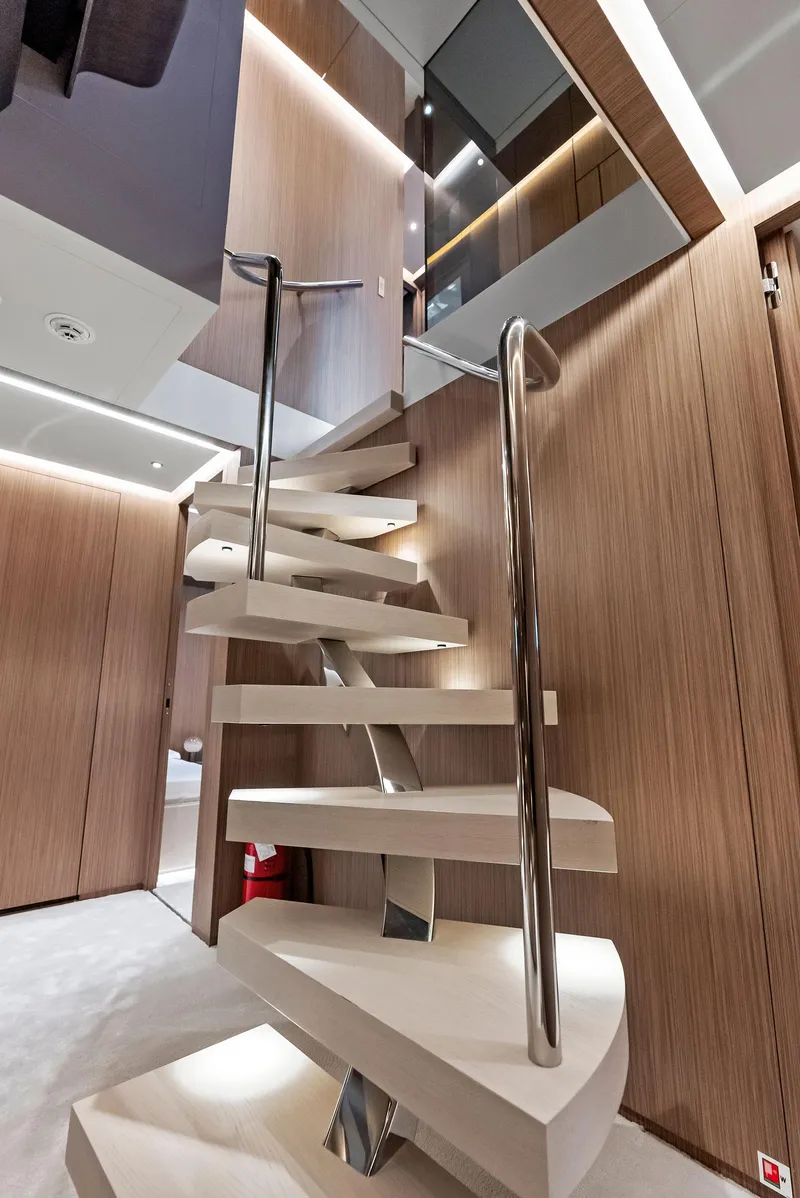 Slide: The Image of Modern spiral staircase in 2023 Custom Line 106' yacht interior. - 20