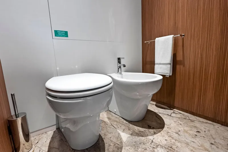 Slide: The Image of Luxury yacht bathroom with toilet and bidet, Custom Line 106', 2023 model. - 38