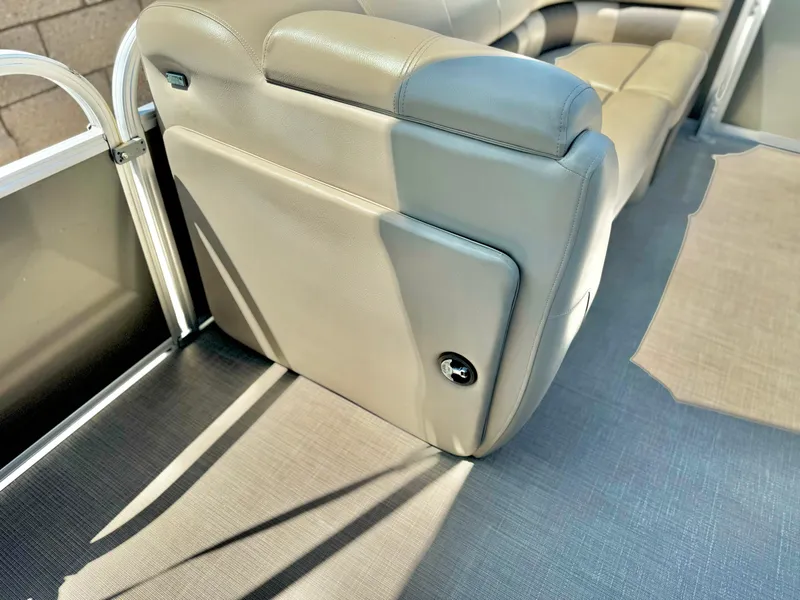 Slide: The Image of 2023 Sun Tracker Party Barge 20 DLX interior seating with beige upholstery. - 15