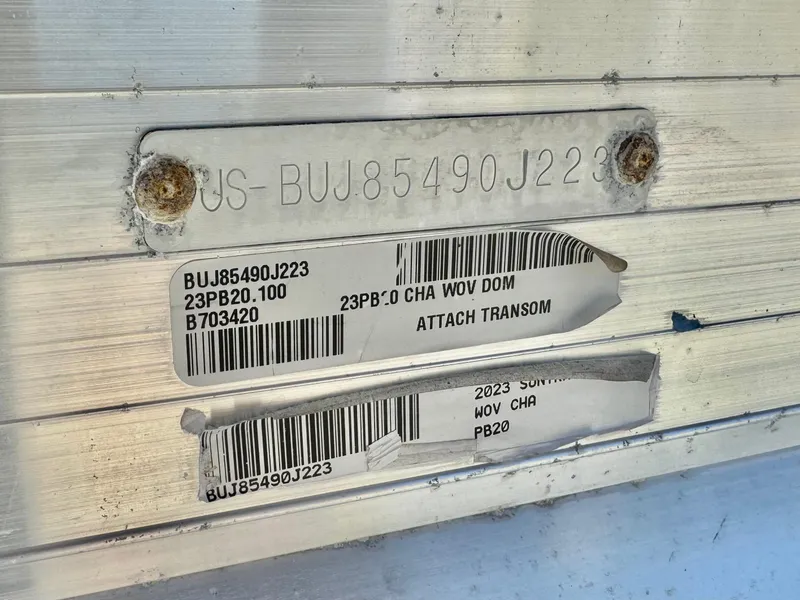 Slide: The Image of 2023 Sun Tracker Party Barge 20 DLX hull identification number and barcode labels. - 26