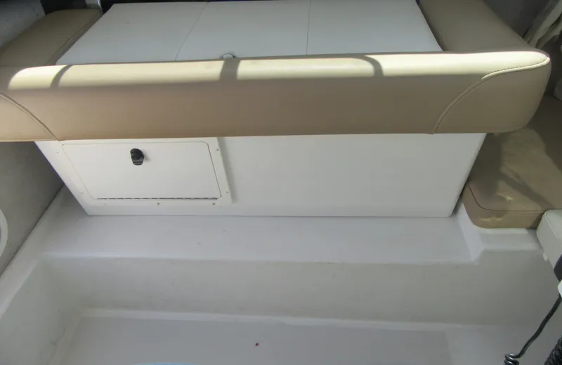 Slide: The Image of 2018 Parker 2320 SL Sport Cabin interior seating with storage compartment. - 17