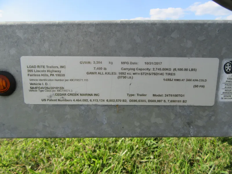 Slide: The Image of Label on Load Rite trailer, detailing specifications and manufacturing information. - 7