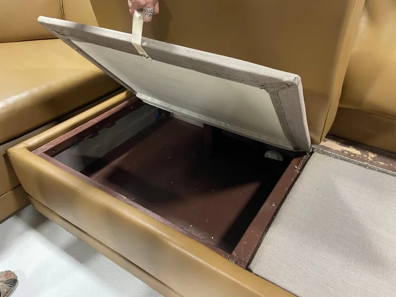 Slide: The Image of Open storage compartment in 1986 Post 43 Sport Fisher boat interior. - 13