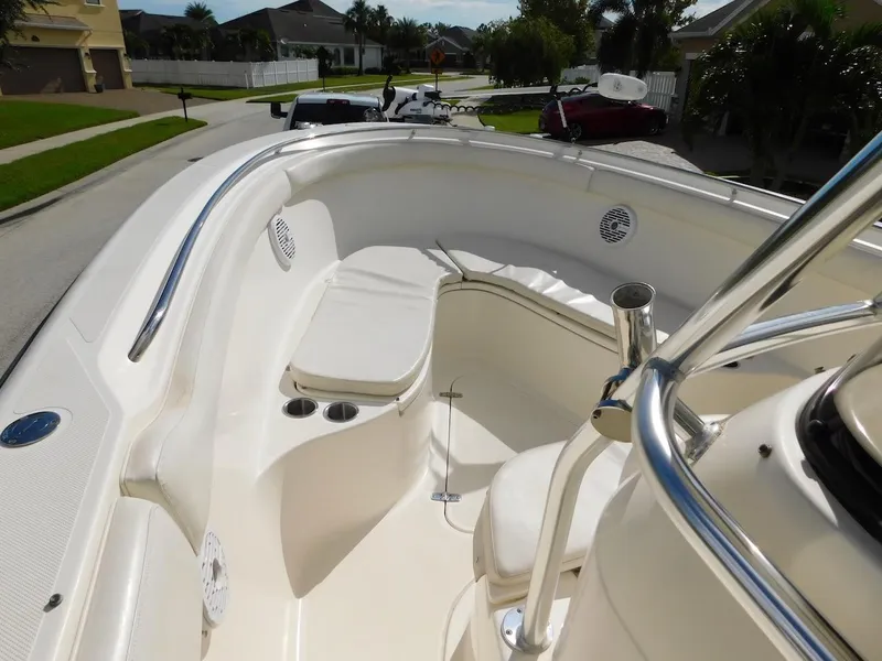 Slide: The Image of 2007 Pursuit 310 Center Console boat with spacious seating and sleek design. - 11