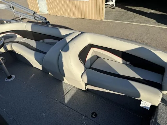 Slide: The Image of 2023 Lowe SD224 boat interior with gray and black seating. - 8