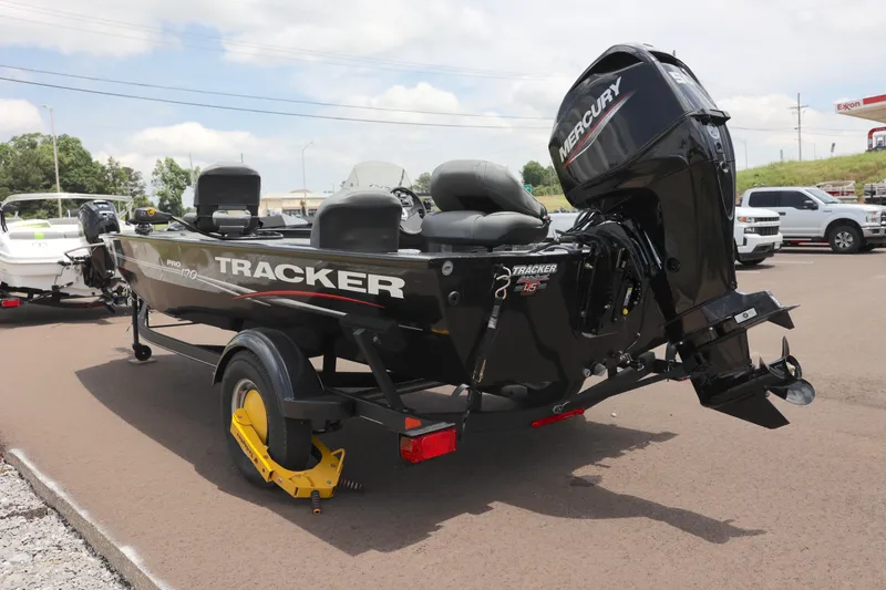 Slide: The Image of 2023 Tracker Pro 170 boat with Mercury engine on trailer in parking lot. - 5