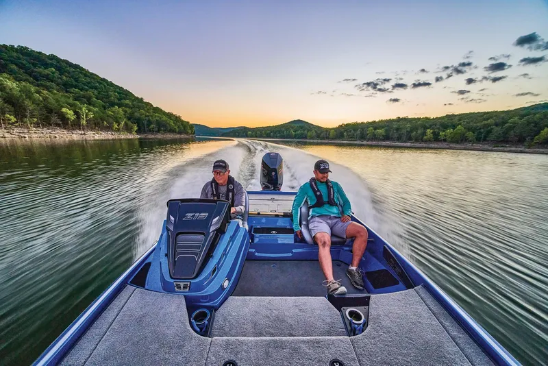 Slide: The Image of 2024 Nitro Z19 boat with powerful outboard motor on a trailer. - 12