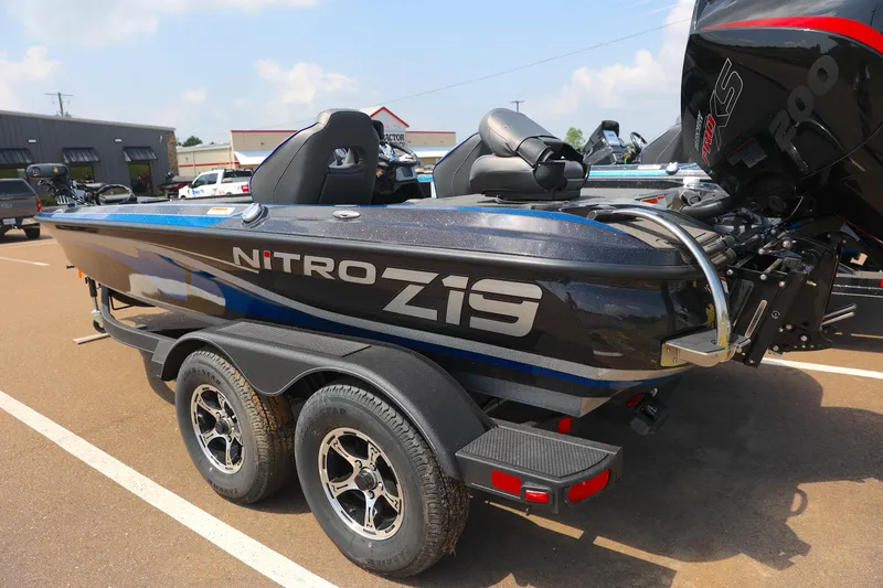 Slide: The Image of 2024 Nitro Z19 boat with trolling motor and Humminbird fish finder on deck. - 2