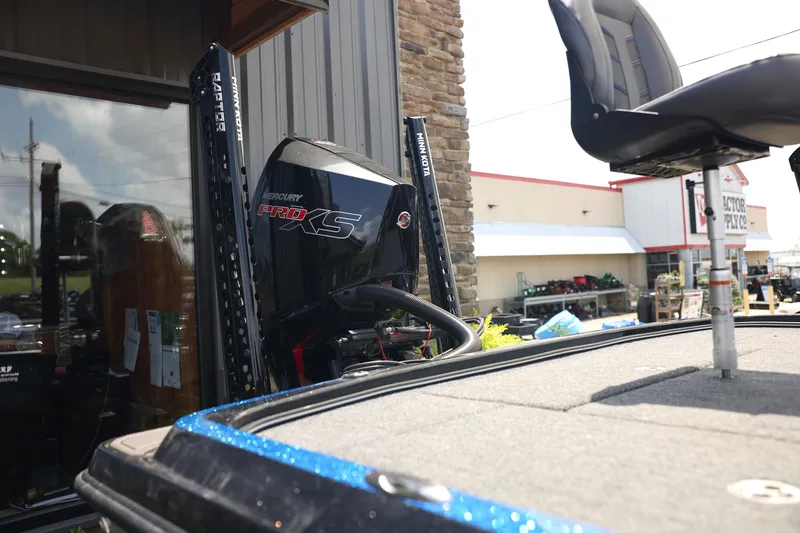 Slide: The Image of 2024 Nitro Z21 XL Pro boat with Mercury Pro XS engine, outdoor display. - 7