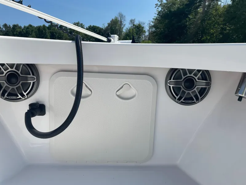 Slide: The Image of 2023 Rambo 27 boat interior with speakers and trolling motor. - 14