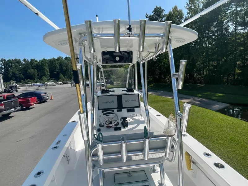 Slide: The Image of 2023 Rambo 27 boat with T-top, rod holders, and Garmin electronics. - 19