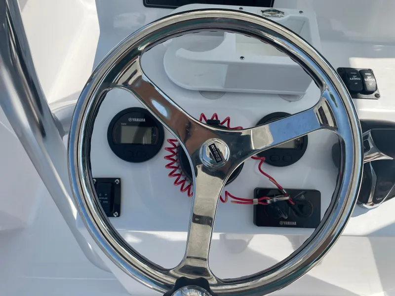 Slide: The Image of 2023 Rambo 27 boat with Minn Kota trolling motor on deck. - 9