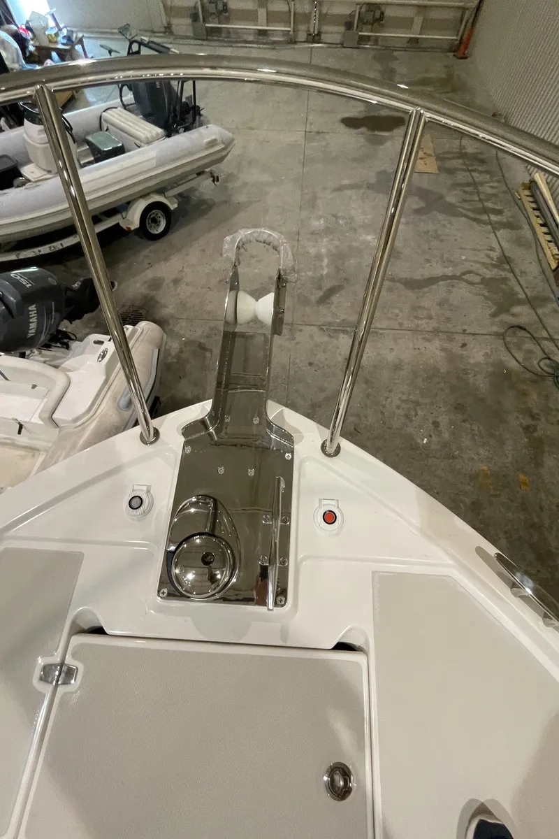 Slide: The Image of 2025 Back Cove 372 boat deck with stainless steel railing and anchor system. - 14