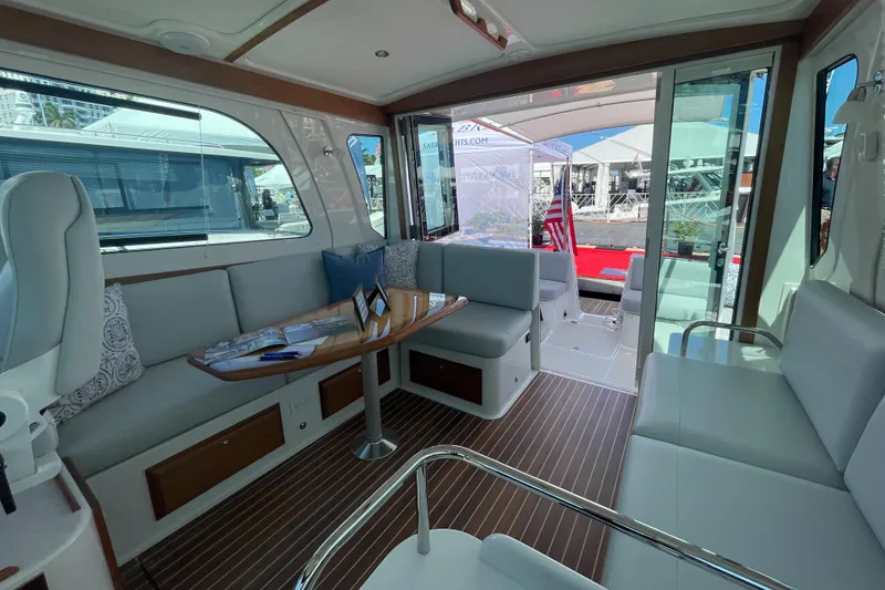 Slide: The Image of Luxurious interior of 2025 Back Cove 372 yacht with elegant seating and wooden flooring. - 36