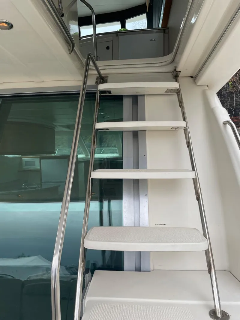 Slide: The Image of Stainless steel ladder on 1997 Maxum 4600 Custom SCB yacht. - 12