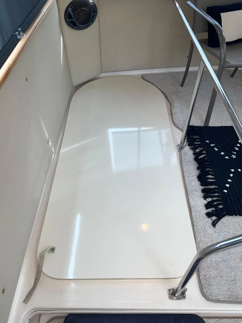 Slide: The Image of 1997 Maxum 4600 Custom SCB yacht interior with sleek flooring and modern railing design. - 14