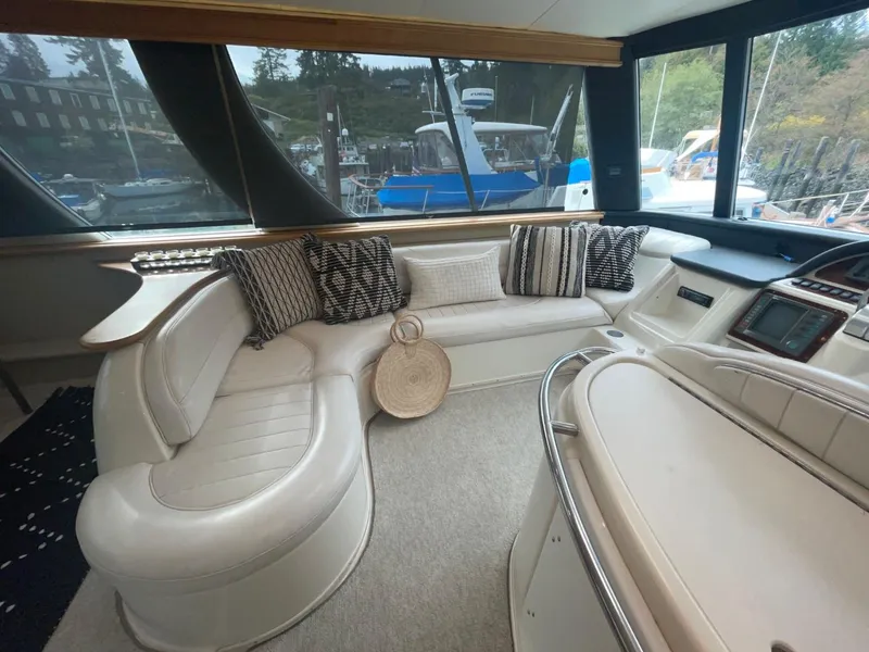 Slide: The Image of Luxurious interior of a 1997 Maxum 4600 Custom SCB yacht with plush seating and stylish decor. - 19