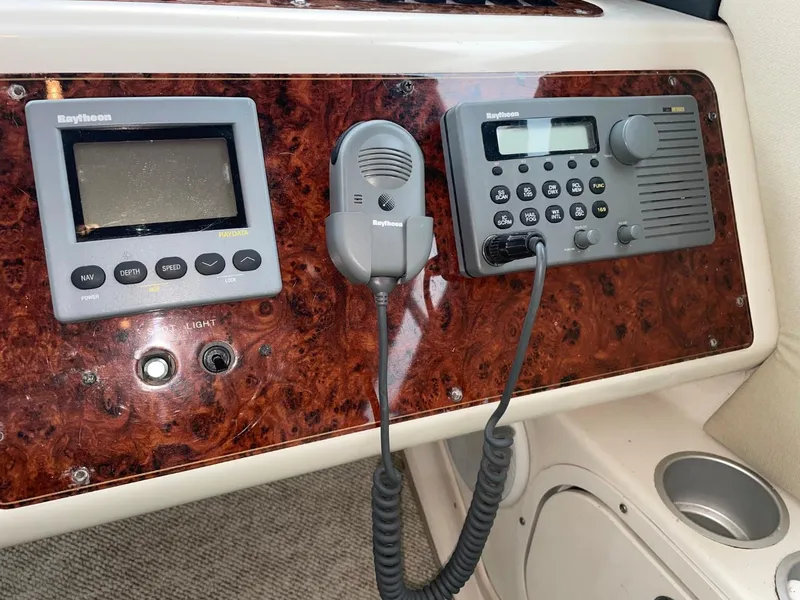 Slide: The Image of Control panel of a 1997 Maxum 4600 Custom SCB with Raytheon navigation equipment. - 29