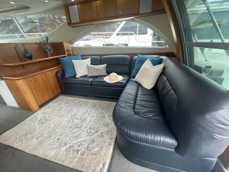 Slide: The Image of Luxurious 1997 Maxum 4600 Custom SCB yacht interior with leather seating and elegant decor. - 35