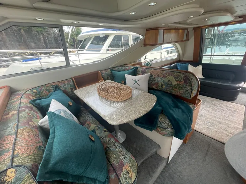 Slide: The Image of Interior of 1997 Maxum 4600 Custom SCB yacht with elegant seating and decor. - 44