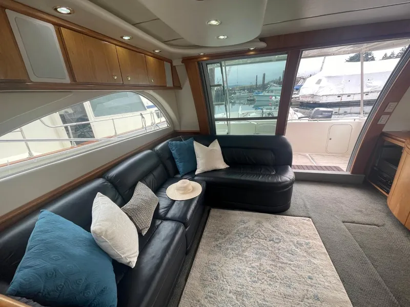 Slide: The Image of Luxurious 1997 Maxum 4600 Custom SCB yacht interior with leather seating and large windows. - 47