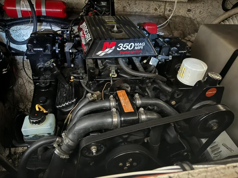 Slide: The Image of MerCruiser 350 MAG MPI engine in 2000 Rinker 330 Fiesta Vee boat. - 17