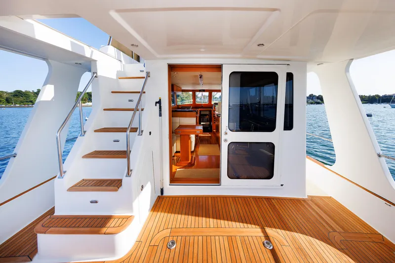 Slide: The Image of Grand Banks 43 Europa 2014 yacht interior with teak deck and staircase. - 18
