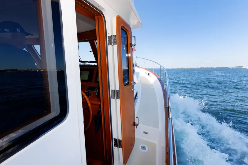 Slide: The Image of Grand Banks 43 Europa yacht cruising on open water, 2014 model. - 27