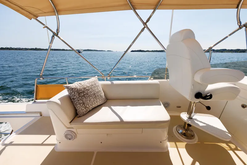 Slide: The Image of Grand Banks 43 Europa 2014 yacht deck with seating and ocean view. - 32
