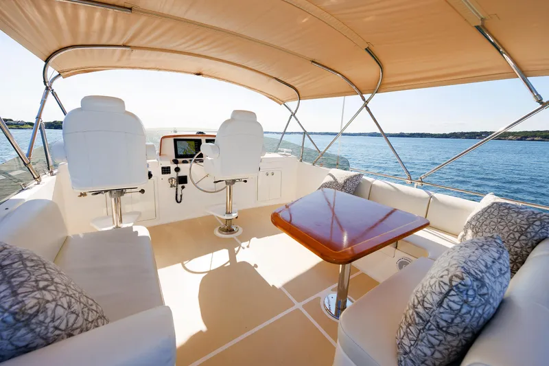 Slide: The Image of Luxurious 2014 Grand Banks 43 Europa yacht interior with seating and navigation area. - 39