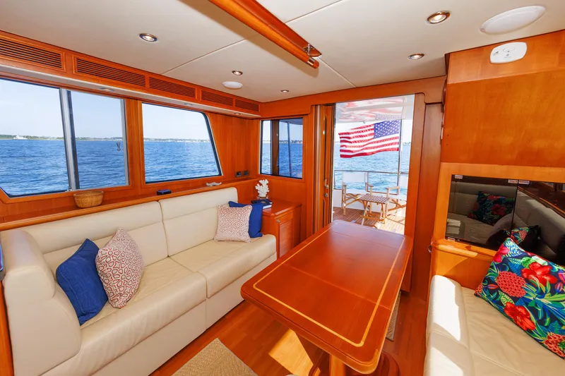 Slide: The Image of Interior of 2014 Grand Banks 43 Europa yacht with ocean view and American flag. - 49