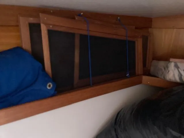 Slide: The Image of Interior of 1998 Catalina 36 MkII with wooden frames and blue fabric. - 12