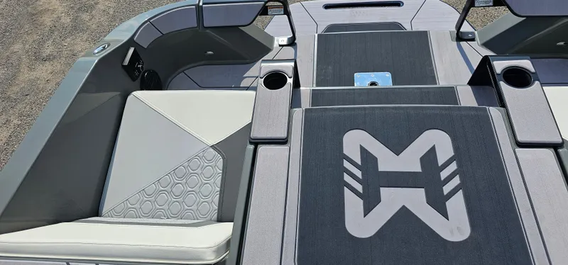 Slide: The Image of 2024 Heyday H20 boat interior with stylish seating and logo design. - 8