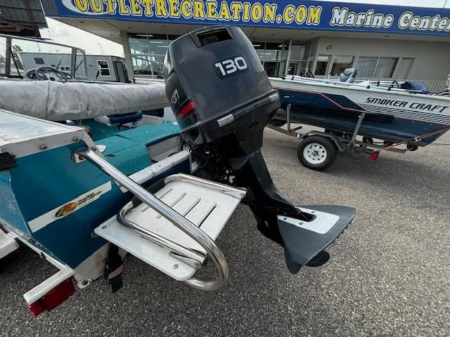 Slide: The Image of 1995 Crestliner 1750 SPORT FISH boat with 130 HP outboard motor at marine center. - 28