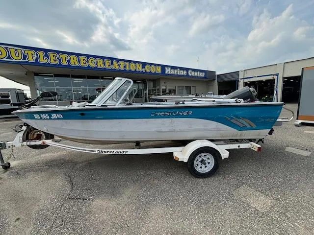 Slide: The Image of 1995 Crestliner 1750 SPORT FISH boat on trailer at marine center. - 30