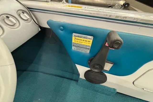 Slide: The Image of Interior of 1995 Crestliner 1750 SPORT FISH boat, showing seating capacity label and controls. - 35