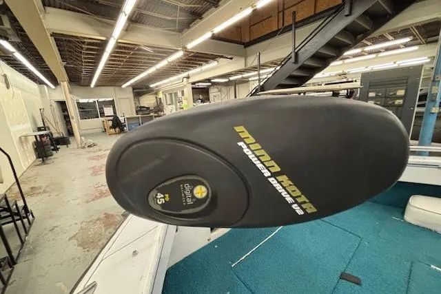 Slide: The Image of 1995 Crestliner 1750 SPORT FISH boat with Minn Kota Power Drive V2 motor in a workshop. - 38