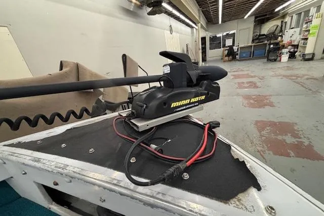 Slide: The Image of Minn Kota trolling motor on 1995 Crestliner 1750 SPORT FISH boat in a workshop. - 39