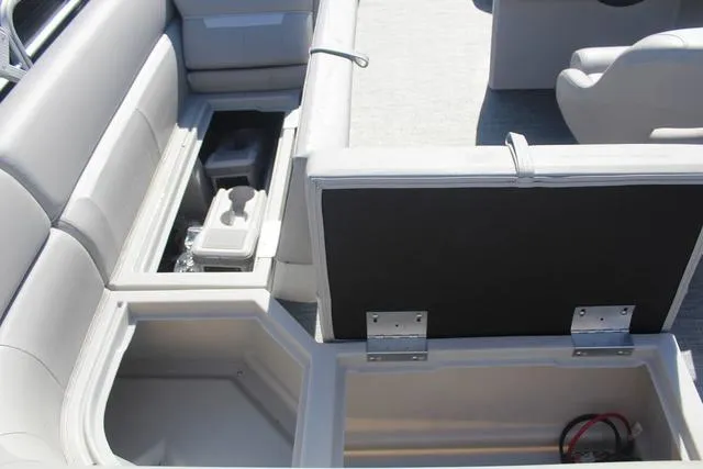 Slide: The Image of 2025 Godfrey Pontoons Xperience 1680 CX interior storage compartments and seating. - 10