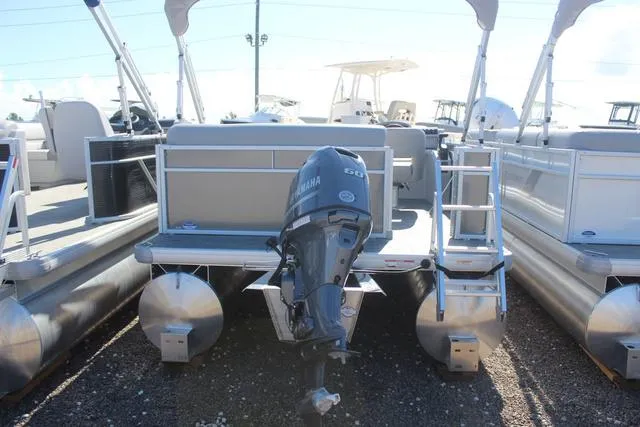 Slide: The Image of 2025 Godfrey Pontoons Xperience 1680 CX with Yamaha outboard motor, rear view. - 4