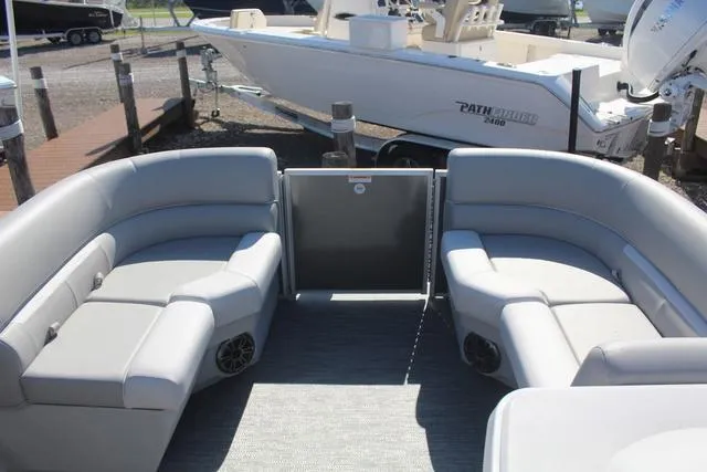 Slide: The Image of 2025 Godfrey Pontoons Xperience 1680 CX interior with gray seating and open deck. - 5