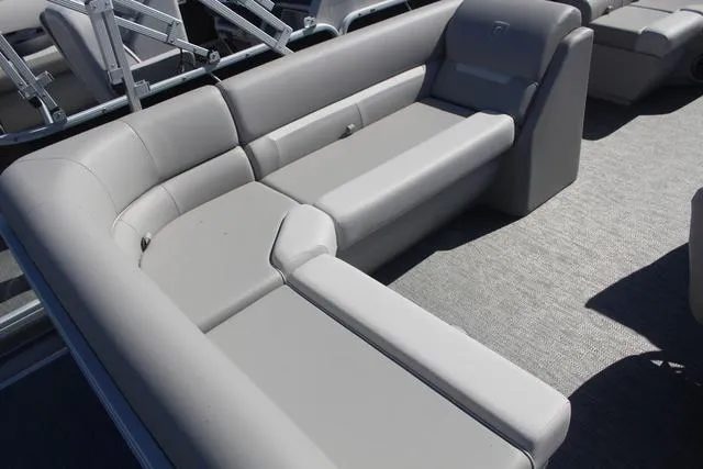 Slide: The Image of 2025 Godfrey Pontoons Xperience 1680 CX, featuring sleek gray seating and modern design. - 7