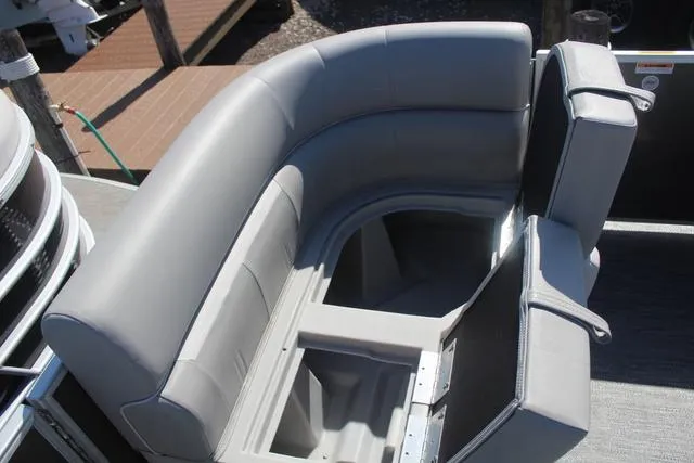 Slide: The Image of 2025 Godfrey Pontoons Xperience 1680 CX with gray seating and storage compartment. - 8