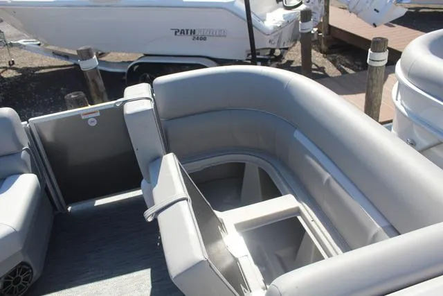 Slide: The Image of 2025 Godfrey Pontoons Xperience 1680 CX interior seating area with gray upholstery. - 9