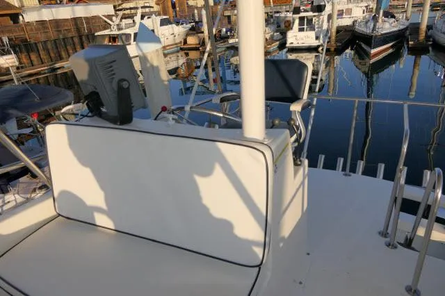 Slide: The Image of 1988 Jersey 36 Convertible Sportfisher bathroom with shower and wooden cabinetry. - 23