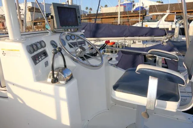 Slide: The Image of Shower area in 1988 Jersey 36 Convertible Sportfisher boat, featuring dual knobs and hose. - 24