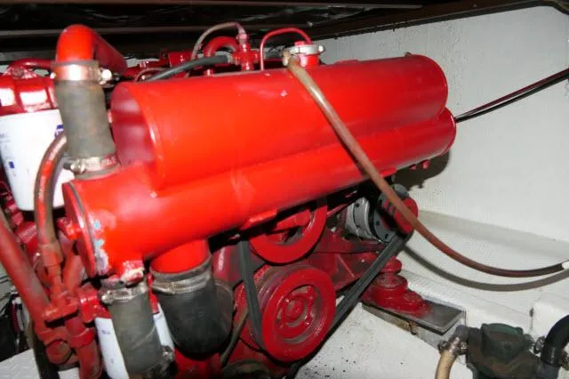 Slide: The Image of 1988 Jersey 36 Convertible Sportfisher boat deck with marina view in the background. - 30