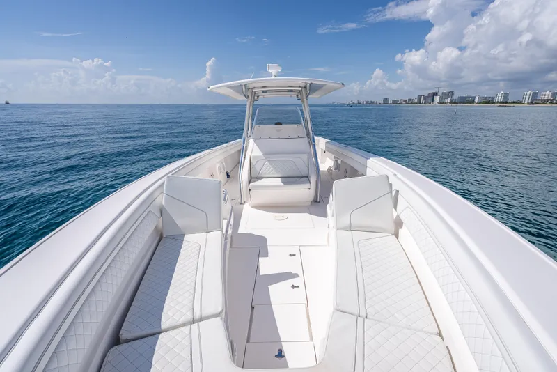 Slide: The Image of 2017 Intrepid 400 Center Console boat on open water, clear sky. - 13