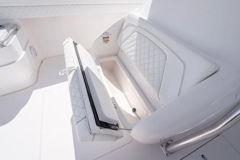 Slide: The Image of 2017 Intrepid 400 Center Console boat seat with storage compartment. - 15