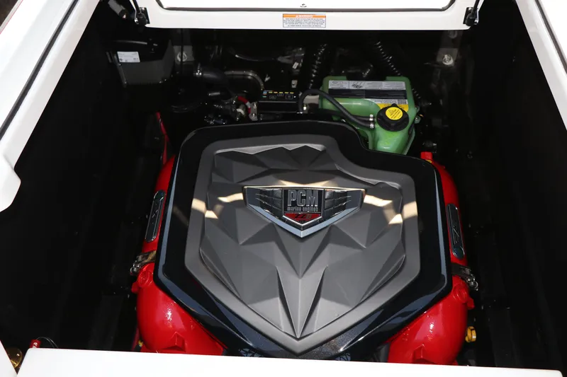Slide: The Image of 2025 Nautique G25 engine compartment with PCM engine cover. - 20